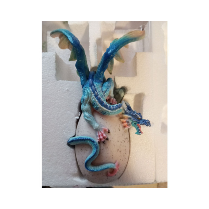 Dragon bleu sur un oeuf - Figurine